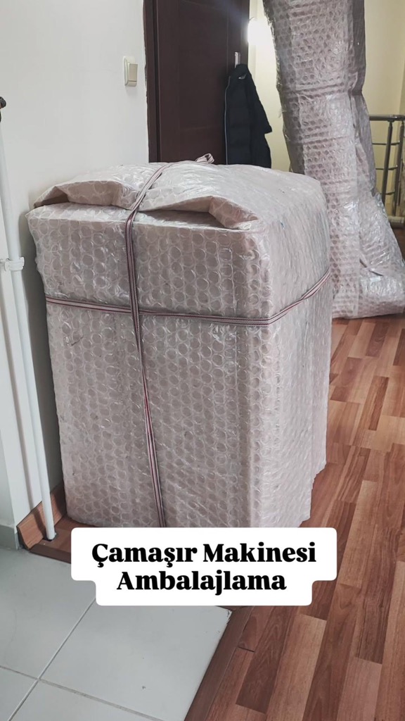 Taşımaya hazır, ambalajlanmış çamaşır makinesi
